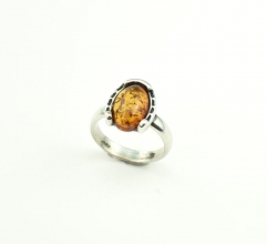Bernstein Ring Cognacglnzend transparent in Silber gefasst